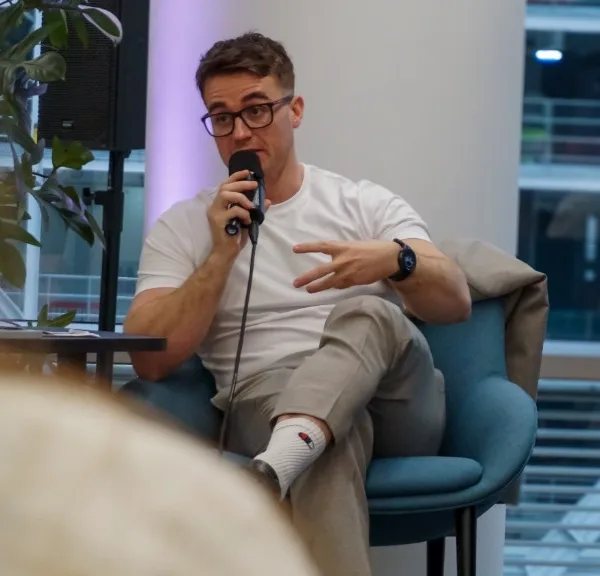 Dr Alec Burns speaking on a panel discussion