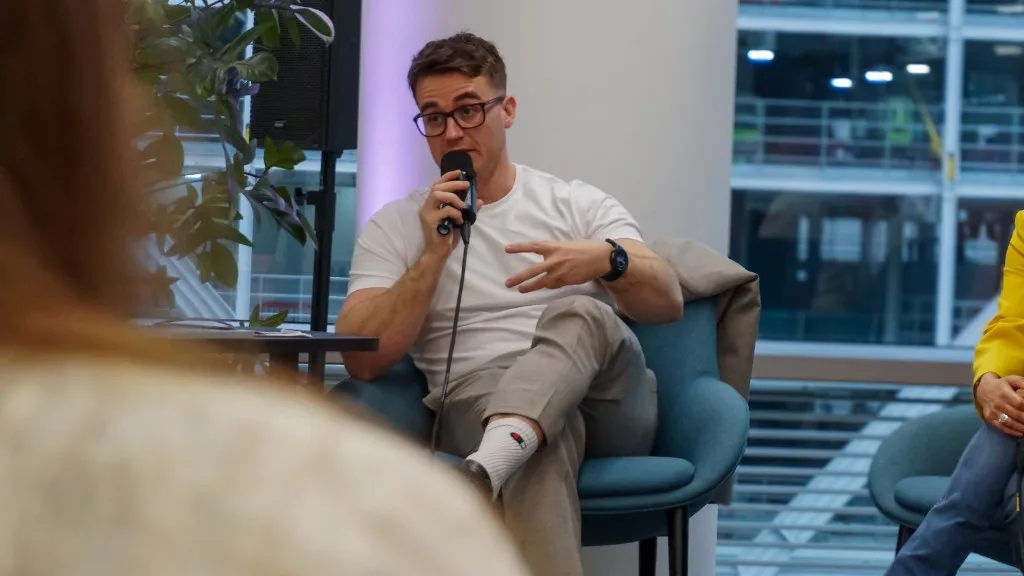 Dr Alec Burns speaking on a panel discussion