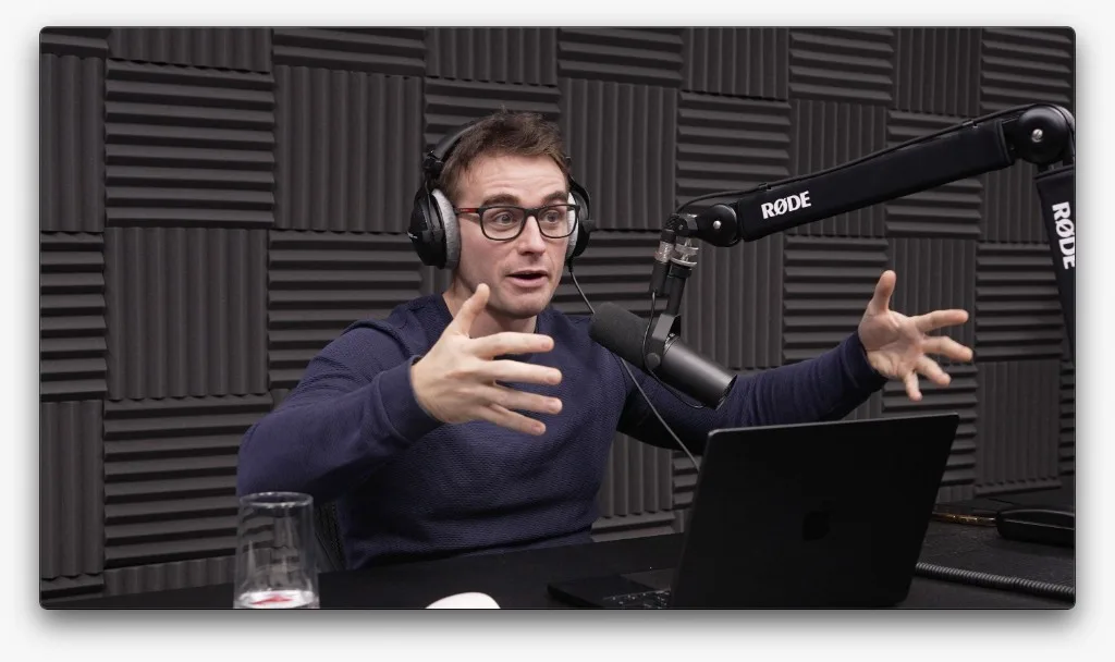 Dr Alec Burns recording Untangling Web3 in the podcast studio